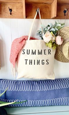 The SUMMER THINGS over sized canvas tote bag is perfect minimalist bag for a trip to the beach!  Available with text in several colors... check out the variations!  This bag is made from 100% thick, sturdy canvas. AVAILABLE IN TWO SIZES * Large - 19.5" x 13" with a 4" gusset *Jumbo - 23" x 13" with a 6" gusset   These bags are hand painted using non-toxic fabric paint.  The technique used creates an attractive distressed appearance to the text that varies from bag to bag.  All of my products are Large Capacity Canvas Bag For Spring Beach Outings, Casual Summer Canvas Shopping Bag, Casual Summer Canvas Bag For Shopping, Casual Canvas Bag For Summer Shopping, Large Capacity Canvas Beach Bag For Summer, Casual Spring Vacation Canvas Bag, Summer Canvas Bag For Shopping With Large Capacity, Summer Large Capacity Canvas Shopping Bag, Large Capacity Summer Canvas Bag