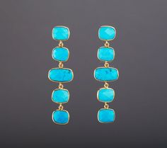 This pair of five-tier genuine turquoise earrings would be nice reward for yourself or a great gift for your mother or best friend.Each one has five turquoise stones set in gold plated bezels and connected in tandem.1. Stones : turquoise (reconstituted stabilized) 2. Stone shape and size:middle stone: about 16 x 10 mmother stone about  :  12 x 10 mm,3. earring total length ~ 64 mm4. bezel material: 24k gold vermail5. earring post: 24k gold vermail6. if sending as a gift, a personalized note card Turquoise Chandelier, Turquoise Stone Jewelry, Earring Frame, String Earrings, Earring Long, Turquoise Earring, Engraved Locket, Natural Turquoise Stone, Turquoise Earrings Dangle