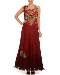 This shaded maroon color frock suit is in chiffon fabric having zari embroidery on neck. Backside of this frock suit is designed in beautiful flairs which enhance look of this frock suit. Dupatta of this frock suit is also in chiffon having golden color borders. Red Anarkali Dress With Resham Embroidery, Elegant Red Maxi Length Set, Elegant Semi-stitched Red Anarkali Set, Elegant Red Anarkali Set, Formal Party Gown With Dabka Work, Sleeveless Chinon Dress With Dupatta, Elegant Red Unstitched Suit In Chinon, Elegant Red Unstitched Chinon Suit, Red Georgette Salwar Kameez For Formal Occasions