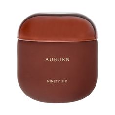 an empty brown container with the word,'auburnn ninety six'on it