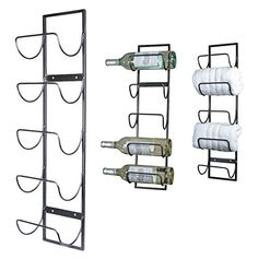 three wine racks holding bottles and paper towels