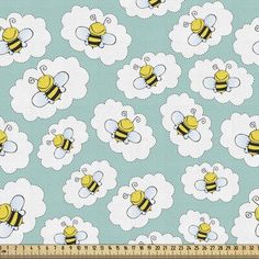 a blue and white background with yellow bees on clouds, in the center is a ruler