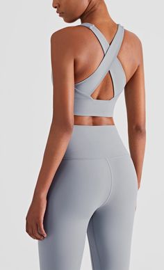 The EMES SHOP sports bra details a soft buttery touch that exemplifies comfort in sportswear. Featuring a cross back. this athletic wear will be your go-to for each workout session.MATERIAL: 75% Nylon. 25% Spandex MEASUREMENTS: Small | Bust: 34" in . Band: 28" in . Length: 32.5" in Medium | Bust: 36.5" in . Band: 30.5" in . Length: 33.5" in Large | Bust: 39" in . Band: 33" in . Length: 34.5" in MEASUREMENTS: Small | Bust: 86.4" cm . Band: 71.1" cm . Length: 82.5" cm Medium | Bust: 92.7" cm . Band: 77.5" cm . Length: 85.09" cm Large | Bust: 99.1" cm . Band: 83.8" cm . Length: 87.6" cm Back Fitness, Fire And Desire, Underwire Sports Bras, Yoga Pictures, Sports Bra Top, Picture Style, Functional Fashion, Black Sports Bra, Sleek Look