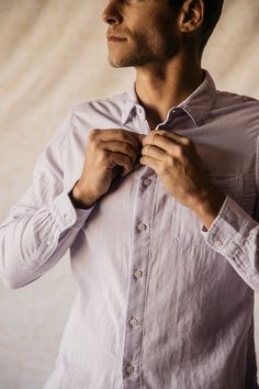 We’ve taken your everyday office friendly work shirt up a notch or five. This ultra soft shirt is made from a double gauze 100% organic cotton giving it a nice natural soft texture. Reinforced with thick durable buttons - trust us, you won’t be losing any of these, It’s the perfect length leaving you the option to tuck in or not. From your weekend getaway to client meetings, the Ripper shirt is a true multi-purpose champ giving you the perfect blend of sophistication and comfort. Business Casual Purple Cotton Shirt, Purple Cotton Business Casual Shirt, Everyday Lavender Cotton Tops, Purple Shirt With Relaxed Fit And Buttons, Purple Shirt With Buttons And Relaxed Fit, Purple Cotton Shirt With Pockets, Purple Relaxed Fit Shirt With Buttons, Casual Lavender Button-up Shirt, Lavender Long Sleeve Shirt For Work