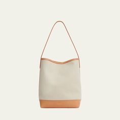 Mansur Gavriel everyday hobo bag in linen and cotton  Shoulder strap, 11" drop Open top with magnetic closure  Approx. 13.4"H x 10.4"W x 6.7"D Made in Italy Daily Use Coated Canvas Bucket Bag With Detachable Strap, Everyday Coated Canvas Bucket Bag With Detachable Strap, Everyday Bucket Bag With Detachable Strap In Coated Canvas, Bucket Shoulder Bag In Coated Canvas With Adjustable Strap, Versatile Canvas Satchel For Errands, Versatile Beige Hobo Bag With Leather Handles, Modern Top Handle Bucket Bag For Errands, Shopping Hobo Bag With Removable Pouch In Coated Canvas, Leather Bucket Bag With Canvas Lining For Daily Use