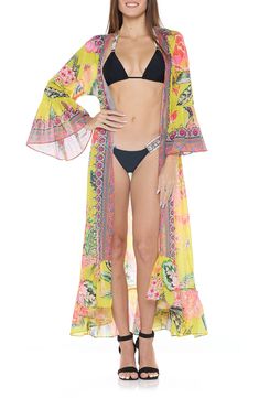 A vivid floral print brightens a vacation-ready cover-up crafted in a longline duster silhouette with ruffle sleeves from lightweight fabric. 52" length (One size) Open front Three-quarter sleeves 100% polyester Hand wash, dry flat Imported Spring Multicolor Swimwear For Beach Cover-up, Long Spring Beach Cover-up Swimwear, Long Beach Cover-up Swimwear For Spring, Spring Beach Cover-up Duster, Spring Long Sleeve Pool Cover-up, Yellow Long Sleeve Swimwear For Spring, Spring Beach Cover-up Duster Open Front, Spring Open Front Duster For Beach, Spring Bohemian Swimwear