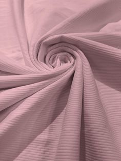 a close up view of a pink fabric