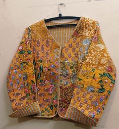 About this item Indian Handmade patch work Jackets, Coats, Boho ,Quilted, For Women`s Made In India RETURN AND EXCHANGE POLICY -Buyer is responsible for return shipping costs Buyer is responsible for loss in value (as agreed upon with seller) if an item isn't returned in original condition Size - All Size WE INCREASE SIZE MEASURE AND UPDATED Small Size - Chest -38 inch Length- 20.5 inch Sleeves -23 inch Medium Size - Chest-40 inch Length- 20.5 inch Sleeves -23 inch Large Size - Chest- 42 Inch Le Bohemian Cotton Outerwear With Button Closure, Fall Cotton Blazer With Patchwork, Vintage Cotton Quilted Jacket For Fall, Long Sleeve Cotton Quilted Jacket With Buttons, Handmade Long Sleeve Cotton Outerwear, Quilted Cotton Jacket With Buttons, Long Sleeve Cotton Patchwork Blazer, Vintage Long Sleeve Cotton Quilted Jacket, Yellow Long-sleeved Cotton Blazer