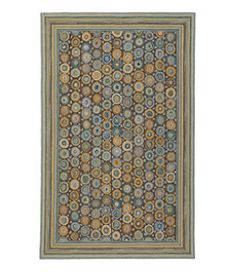 an area rug with various colors and designs