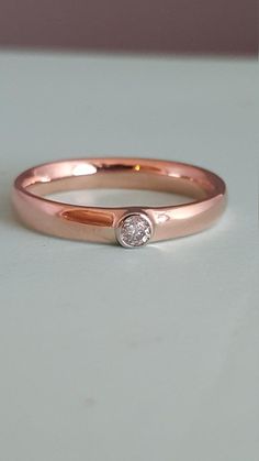 Rose Gold Diamond Wedding Ring With Bezel Setting, Rose Gold Diamond Wedding Ring With Polished Finish, 14k Rose Gold Diamond Ring With Bezel Setting, Elegant Pink Gold Ring With Bezel Setting, Elegant Pink Gold Rings With Bezel Setting, Luxury Rose Gold Diamond Ring With Bezel Setting, Rose Gold Diamond Ring With Bezel Setting As Gift, Many Rings, Solitaire Diamond Ring