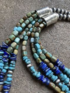 Sterling Silver Multi Strand Blue Green Turquoise Lapis Bead Necklace. 26 inch Artisan Turquoise Multi-strand Necklace, Blue Turquoise Necklace With Round Beads, Southwestern Multi-strand Turquoise Beads, Blue Oval Beads Single Strand, Blue Necklace With Hand-strung Oval Beads, Blue Artisan Necklace With Large Beads, Artisan Blue Necklace With Large Beads, Southwestern Blue Beaded Necklaces For Gift, Blue Single Strand Oval Beads