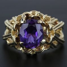 14k Yellow Gold Amethyst Cocktail Ring This Ring Is Made Of 14 Karat Yellow Gold & Features A Large Amethyst Gemstone Placed On An Extremely Detailed Setting. The Band Is A Size 10 & Has "14k" Stamped Onto The Inner Part Of It. Size: 10 (Resizable) Weight: 4.5dwt // 7grams Metal: 14 Karat Yellow Gold Stone: 1 Amethyst Gemstone (10.3mm X 8.1mm) 19040-11 * E-Cdr Amethyst Cocktail Ring, Payment Receipt, Gold Stone, Amethyst Gemstone, Cocktail Ring, Purple Gold, Womens Jewelry Rings, Cocktail Rings, Jewelry Watches