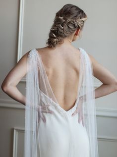 Beautiful and soft bridal cape with cascading pearls. Made of luxurious english net fabric to create an effortless drape. Faux pearls embellish this cape starting dense at the top and trickling down as they get further down the back. Cape attaches at the shoulders with either small white ribbons (for dresses with spaghetti straps) or small 1 inch clasps (for dresses with thicker straps). Attaches at the shoulders and drapes into a "V" shape. Lengths:-Floor (65 inches)-Chapel (80 inches)-Cathedra Tulle Wedding Veil, Veil Accessories, Wedding Cape, Tulle Bows, Bridal Cape, Bridal Gloves, Bow Hair Accessories, Pearl Bridal, Long Gloves