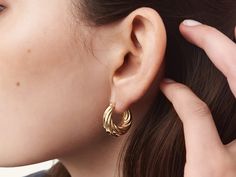 The Blair Earrings complement any stacking earring game. Its twists and details are what make us love them so much. These earrings are sold in pairs. PRODUCT DETAILS Composition: Metal: Stainless Steel; Coating: 14k golden color PVDMeasurements: Length: 1.89cm/.74'' ; Width: 84mm/.33'' ; Weight: 7.5g/0.016lb CARE GUIDE Our pieces are waterproof, so do your daily routine without having to take it off! Shower with them or take a swim Apply any type of lotion from moisturizer to sunscreen Use perfu Everyday 14k Gold Earrings With A Modern Twist, Modern Twist Tarnish Resistant Earrings For Gifts, Modern Twist Tarnish-resistant Earrings As Gift, Modern Tarnish Resistant Earrings For Gift, Modern Twist Everyday Earrings, Modern Twist Gold Earrings For Everyday, Elegant Twisted Earrings For Pierced Ears, Modern Twist Tarnish Resistant Twisted Earrings, Gold Earrings With A Modern Twist For Everyday