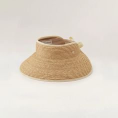 Mita | Natural Sand Wide Raffia Visor Hat | Helen Kaminski Helen Kahminski Hat, Packable Natural Straw Hat, Adjustable Elegant Sun Hat In Paper Straw, Packable Straw Hat In Natural Color, Adjustable Natural Braided Hat, Handwoven Adjustable Straw Hat, Adjustable Lightweight Straw Hat, Adjustable Lightweight One Size Straw Hat, Adjustable Handwoven Sun Hat From Paper Straw