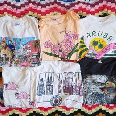 Pick Your Travel Tee! Price is for 1 t-shirt or tank of your choice. Send me a message to receive a discounted price if you are interested in buying more than one.  Vintage 1980s to early 1990s souvenir tees from all around. Cool retro graphics and comfy well worn feel. Feel free to reach out for more details or pictures. All are in vintage condition so wrinkles, blemishes, small rips, and other signs of wear may be present. Vintage Multicolor T-shirt With Letter Print, Vintage Multicolor Letter Print T-shirt, Multicolor Vintage T-shirt With Letter Print, Vintage Summer Fan Merchandise Tops, 90s Inspired Graphic Print T-shirt For Fans, 90s Style Multicolor Tops For Fan Merchandise, Vintage Summer Tops For Fan Merchandise, Casual Tops With Vintage Print For Fan Merchandise, Vintage Multicolor Screen Print T-shirt