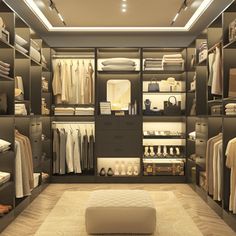 a walk - in closet with lots of clothes and shoes on the shelves, along with a footstool