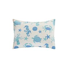 a blue and white pillow with sea animals on it