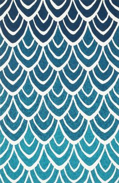 an iphone screen showing the pattern for a wallpaper with blue and white waves on it