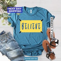 "Believe Shirt, Motivational Sport T-shirt, Ted Shirt, Team Tee, Believe T-shirt, Lasso Believe Shirt, Lasso Gift Hi! Welcome NeoTeeApparel. It's great to see you here! ☺️  Our shirts are clean, high quality and soft. It is prepared quickly by our boutique.  Ironing and shipped.  Enjoy your shopping!  It is a pleasure for us to help you with your questions and you can reach us at any time.  Please, don't forget to check our size cards. HOW TO ORDER SHIRT 👕  Please, choose your favorite t-shirt Blue Tops With Letter Print And Comfortable Fit, Comfortable Blue Letter Print Top, Blue Letter Print Top With Comfortable Fit, Blue T-shirt With Graphic Print, Comfortable Fit, Comfortable Fit Blue T-shirt With Graphic Print, Comfortable Blue T-shirt With Graphic Print, Basic Blue T-shirt With Slogan, Ted Lasso, Text Shirt