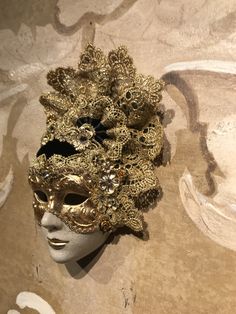 Height: 27 centimeters Width: 16 centimeters Piece of Art Traditional and original porcelain Venetian mask, handmade and decorated with Burano Lace,gold leaf leaf,swarovski,trimmings and velvet All our masks are handmade in our stores located in Venice. Our decorators use techniques typical of the Venetian tradition such as stucco, acrylics, gold and silver-leaf, macramè, passemenerie, pearls and crequelè to give you a wide range of masks. We ship worldwide with GLS, DHL, FedEx. Very accurate pa Traditional Baroque Masks And Prosthetics For Carnival, Traditional Baroque Theater Masks, Venetian Baroque Masks For Theater, Artistic Baroque Masks For Parties, Artistic Baroque Masks For Party, Traditional Baroque Mask For Mardi Gras, Artistic Baroque Party Masks, Baroque Masquerade Mask For Mardi Gras, Artistic Baroque Masks For Carnival