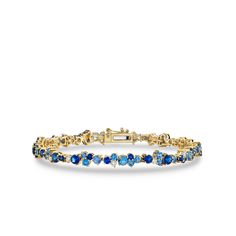 Discover timeless elegance with Sydney Evan's exquisite fine jewelry collection. This stunning tennis bracelet is crafted with meticulous attention to detail from 14k yellow gold, adorned with captivating blue sapphires and dazzling diamonds. The bracelet measures 6.75" in length, perfectly accentuating your wrist with a touch of sophistication. Elevate any ensemble with this exquisite piece that effortlessly combines classic style and modern allure. Explore Sydney Evan's fine jewelry ... Sapphire Bracelet Gold, Blue And Yellow Jewelry, Blue Tennis Bracelet, Something Blue Bracelet, Yellow Gold Sapphire Tennis Bracelet For Formal, Yellow Gold Sapphire Tennis Bracelet For Formal Occasions, Formal Sapphire Tennis Bracelet In Yellow Gold, Formal Yellow Gold Sapphire Tennis Bracelet, Blue And Gold Bracelets