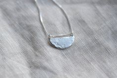 Lovely everyday necklace in a 'half moon' shape. Handmade in recycled silver with a hammered and textured finish giving an organic quality. Perfect for everyday wear. Measures approximately 18mm at the widest point and comes on a 45cm silver curb chain. Comes in a Darte branded gift box which is made from 100% eco-friendly cardboard. Perfect for giving jewellery as a gift or for storing your jewellery in. All jewellery is handmade by me. Although I try to keep consistency across each product, please note your piece may vary very slightly to the picture shown. Small Silver Necklace, Organic Jewellery, Hammered Silver Jewelry, Handmade Silver Jewellery, Silver Necklace Pendant, Organic Jewelry, Small Circle, Jewelry Workshop, Moon Shape