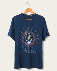 Featuring an iconic Steal Your Face Grateful Dead graphic on our signature, super soft Vintage Tee in faded blue color Outerspace, here is another tee for all those Deadheads out there! The multi-colored graphic sits front and center on the tee that has been given vintage destruction details, like grinding on the neck, hem and sleeve. Made of 100% lightweight cotton, this tee is relaxed and oversized. Shop our Grateful Dead Collection HERE and Music Collection HERE. Faded Graphic Tee T-shirt Pre-shrunk, Blue Vintage T-shirt With Relaxed Fit, Retro Blue Soft-washed T-shirt, Blue Band Merch T-shirt With Graphic Print, Faded Graphic Tee Pre-shrunk, Faded Pre-shrunk Graphic Tee, Blue Grunge Graphic Design Tops, Blue Grunge Top With Graphic Design, Blue Distressed Grunge Tops