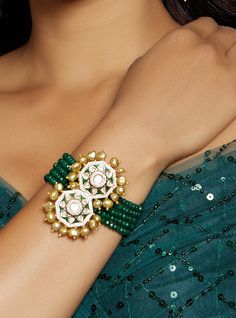 Alluring Green & Golden Polki Bracelet - Joules By Radhika This designer kundan polki bracelet is completed with rich green agate beads & fresh water pearls. Ideal to be worn on party, festive or wedding occassions on your Indian or fusion attire. Every artistic piece from Joules by Radhika is made with real semi precious stones only, giving it a regal look & feel. SET INCLUDES: Bracelet Details: Handcrafted with ❤️ Metal: Brass Product Type: Bracelet Stone: Hydro Polkis, Green Agate Beads, Gold Polki Bracelet, Bridal Jewellery Online, Beautiful Jewelry Diamonds, Indian Bridal Jewelry, Bracelet Stone, Bracelet I, Bridal Jewellery Indian, Fresh Water Pearls, Rich Green