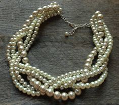 "Champagne and Ivory Chunky Pearl Necklace, Multi Strand Wedding Necklace, Pearl Statement Necklace on Silver or Gold Chain with Lobster Claw Hook Length: 24 inches from end to end. Hooks between 20 and 24 inches. DISCOUNT: If you order 5 or more of the same type of item (ex: 5 or more bracelets) you will be refunded 10% of your order price after your order is placed. If you order 10 or more items of the same type, your refund will be even bigger at 15%! Expedited shipping available upon request Wedding Necklace Pearl, Ivory Pearl Necklace, Handmade Pearl Necklace, Multi Strand Pearl Necklace, Chunky Pearl Necklace, Necklaces Pearl, Prom Birthday, Chunky Pearls, Pearl Statement Necklace