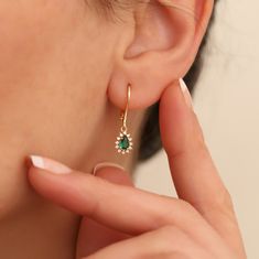 "Discover the epitome of elegance with our 14K Solid Gold Earrings, featuring authentic Emeralds & Diamonds. The perfect May birthstone gift for your mother, girlfriend, or wife, these earrings offer a timeless dangling design that captivates. A true testament to love and craftsmanship, destined to be cherished forever. Believed to be the \"stone of power\", emerald provides physical, spiritual and emotional balance. It is believed to increase spiritual growth, communication, joy, romance, harmo Emerald Drop Earrings, Real Diamond Earrings, Emerald Diamond Earrings, Emerald Earrings Drop, Solid Gold Earrings, May Birthstone, Birthstone Gifts, Emotional Balance, Birthstone Earring