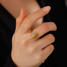 The adjustable tree of life ring is more than just a fashion statement - it's a symbol of connection to nature and spirituality. Crafted from durable stainless steel, this ring not only showcases your passion but also embodies resilience and elegance. Whether you're a nature enthusiast or seeking a meaningful spiritual gift, this versatile accessory is a perfect choice to express your unique style and values. *Adjustable *Material: Stainless steel *This ring is stylish and pretty ideal for everyday use. * Gender: Female/Male *Ready to Ship in 1-2 Business Days * The product will be sent to you nicely packages and ready for gift giving. * Visit our store, browse other jewelry, silver, and gold collections, and find the perfect piece you're looking for. ♥️ Look and favorite my shop ♥️ ♥️ New Tree Of Life Ring, Gift Tree, Life Ring, Geometric Ring, Retro Jewelry, Stainless Steel Ring, Rings Jewelry Fashion, Finger Rings, Gifts For Brother