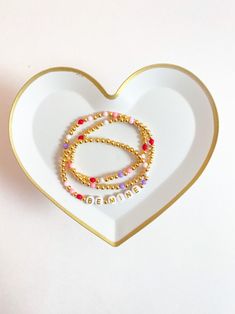 Seasonal Valentine Stacks Beaded Heart Bracelet Pre-made - Etsy Heart Shaped Beaded Bracelet With Letter Beads As Gift, Dainty Beaded Bracelet With Heart Beads For Gift, Dainty Beaded Bracelets With Heart Beads As Gift, Heart-shaped Letter Beaded Bracelets For Mother's Day, Heart-shaped Letter Beads Bracelet Gift, Valentine's Day Heart Bracelet With Letter Beads, Gold Jewelry With Letter Beads For Best Friend Gift, Valentine's Day Gift Beaded Bracelets With Colorful Beads, Heart Beads Friendship Bracelet For Valentine's Day