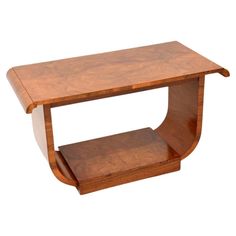 a wooden table with two shelves on each side