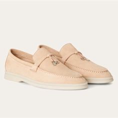 Loro Piana Summer Charms Walk Suede Loafers In Pink Sand Suede Size 36 Exceptionally Comfortable, Sporty Loafers Made From Soft Suede. They Are Enhanced With Non-Marking Rubber Soles A Common Feature Of All Loro Piana Sportswear Shoes. The Front Saddles Are Embellished With Mini My Charms. Perfect For Summers Spent Sailing, At The Beach Or In The City. Minimalist Luxury At Its Finest. Excellent Preloved Condition *Minor Wear On Sole Bottoms, Very Faint Marks On The Medial Side Seen Last Photo Lo Elegant Flat Loafers With Suede Lining, Elegant Suede Slip-ons With Flat Heel, Elegant Slip-on Loafers With Suede Lining, Elegant Calf Leather Flat Slip-ons, Elegant Flat Calf Leather Slip-ons, Elegant Beige Moccasins With Removable Insole, Elegant Almond Toe Flats With Suede Lining, Luxury Spring Loafers With Removable Insole, Elegant Moccasins With Suede Lining For Spring