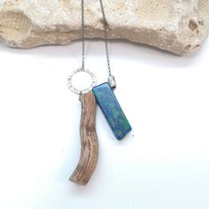 Azurite Necklace Natural Stone Pendant Throat Chakra Crystal Necklace Healing jewelry Vegan Necklace Wooden Necklace This boho piece of jewelry is really light to wear and eco-friendly. All driftwood pieces are collected from the beach and are perfect for people who love nature. ➽DESCRIPTION: The driftwood and gemstone are attached to a sterling silver black rhodium plated chain with a spring-ring closure which is decorated with hammered sterling silver oxidized disc. ➽VARIATIONS Azurite Green G Earthy Handmade Blue Necklace, Rustic Blue Jewelry With Natural Stones, Blue Rustic Necklace For Gifts, Blue Handmade Rustic Necklace, Rustic Blue Necklace For Gifts, Rustic Blue Necklace For Gift, Rustic Blue Handmade Necklace, Rustic Handmade Blue Necklace, Driftwood Necklace