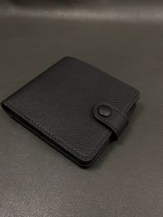 Introducing a carefully handcrafted genuine leather wallet with a gorgeous Italian lining. This unique wallet combines the reliability and timeless beauty that only genuine leather can offer. Soft and fine Italian goat leather adds an extra touch of luxury and comfort to this exceptional piece. 📜Dimensions📜 Closed: 3.4x 4.2 inches (9х11 centimeters) perfectly for everyday use 📜Function📜 This wallet is designed to meet your basic needs while maintaining an elegant and minimalist profile: 1 cash compartment for safe storage of your bills 6 slots for credit cards, ID cards and major cards 2 hidden slots for discreet storage of additional cards or IDs 📜Skill📜 Every aspect of this wallet reflects meticulous attention to detail ar unparalleled craftsmanship: Each wallet undergoes up to 12 Luxury Black Trifold Wallet For Daily Use, Luxury Bifold Wallet With Rfid Blocking, Luxury Trifold Wallet With Rfid Blocking For Daily Use, Luxury Smooth Grain Wallets As Gift, Black Smooth Grain Wallet As Gift, Luxury Leather Trifold Wallet As Gift, Luxury Trifold Wallet With Smooth Grain For Everyday, Unique Wallets, Basic Needs