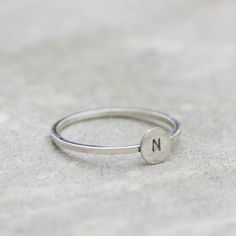 Silver initial ring Simple Personalized Initial Ring For Everyday, Adjustable Initials Stackable Rings For Everyday, Everyday Adjustable Stackable Rings With Initials, Dainty Personalized Initial Ring With Round Band, Personalized Dainty Initial Ring, Personalized Silver Engraved Ring, Simple Stackable Initial Ring, Minimalist Engraved Ring With Initials, Dainty Personalized Initial Ring