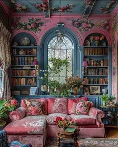 a living room filled with lots of furniture and flowers on the walls, along with bookshelves