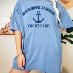 For all the future primaries! Below Deck Yacht Club Shirt DETAILS * Comfort Colors Brand  * 100% Cotton * Design is printed using DTG technology which uses high-quality water-based inks that are printed directly into the fabric. SIZING * Runs true-to-size for unisex shirt * If you're going for a more fitted look, we suggest to size down. If you would like a more oversized look, we recommend sizing up 1 or 3 sizes. * A size charts in provided in the listing. Please always check your size before p Blue Pre-shrunk Crew T-shirt, Blue Crew Neck Top With Screen Print, Blue Crew Neck Screen Print Top, Crew Neck Top With Screen Print Fan Apparel, Crew Neck Cotton Slogan Top, Cotton Slogan Crew Top, Cotton Slogan Crew Neck Top, Cotton Crew Neck Slogan Top, Casual Pre-shrunk Crew Shirt