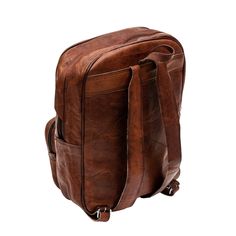 This elegant 16 Inch vintage brown backpack from Classy leather Bags serves as an exemplary option among all other backpacks in the market. Ideal for carrying your Notebook or a small laptop. It can also be used for Tablets, MacBooks, and iPads. It has a multipurpose central compartment for accommodating laptops and diaries as well as money in a segregated manner. The small pockets can hold coins, keys, or other small necessities. The flap has a smart closure with buckles. It's a perfect blend o Vintage Leather Travel Backpack, Vintage Satchel Backpack For On-the-go, Everyday Brown Laptop Backpack, Vintage Brown Backpack For On-the-go, Vintage Rectangular Backpack With Leather Lining, Classic Travel Backpack With Leather Backing, Classic Backpack With Luggage Sleeve, Classic Brown Leather Backpack For Travel, Classic Brown Leather Travel Backpack