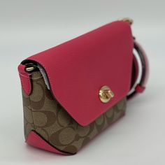 Brand New With Tag Brand New Spring Edition Coach Karlee Crossbody. This Is A Signature With Fuchsia Color. This Is A Must Have For Your Spring Wear. Msrp 298.00 And Selling Out Fast. Thank You For Looking And Please Feel Free To Check Out My Many Other Listings. Signature Coated Canvas And Refined Pebble Leather Inside Multifunction Pocket Turnlock Closure, Fabric Lining Detachable Strap With 22 1/2" Drop For Shoulder Or Crossbody Wear 8" (L) X 5 1/4" (H) X 3 1/4" (W) Pink Pouch Flap Bag With Detachable Strap, Luxury Pink Flap Bag With Removable Pouch, Luxury Pink Bag With Magnetic Closure, Luxury Pink Bags With Magnetic Closure, Pink Satchel Flap Bag With Detachable Strap, Pink Crossbody Flap Bag, Pink Flap Bag With Gold-tone Hardware, Pink Flap Bag With Detachable Strap For Travel, Pink Clutch Flap Bag For Travel