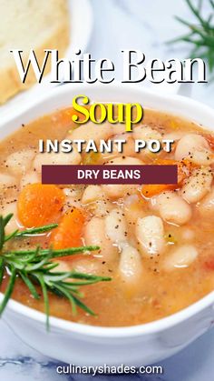 white bean soup in a bowl with bread and rosemary garnish on the side