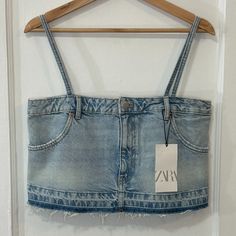 Nwt Zara Women's Light Wash Denim Jean Crop Top, Spaghetti Strap, Size Medium -Brand New With Tags -Fun, Edgy Crop Top -Wear It By It Self With Shorts, Skirts, Or Pants Or On Top Of A White Button Up -2 Front (Real) Pockets -Button & Zip Closure -Raw & Distressed Hem -Color: Light Wash -Non-Adjustable Straps -Material: 100% Cotton -Measurements: Armpit To Armpit 16 3/4 Inch, Length (Armpit To Hem) 9.5 Inch The Miscellaneous Store: Item # A(8) 0009 Denim Blue Cropped Tank Top For Spring, Denim Blue Cropped Denim Tank Top, Denim Blue Cropped Tank Top, Cropped Denim Blue Tank Top, Spring Denim Blue Tank Top, Sleeveless Summer Crop Top With Pockets, Spring Washed Blue Denim Tank Top, Summer Cropped Medium Wash Tank Top, Medium Wash Cropped Tank Top For Summer