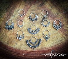 Hand-crafted 9.25 sterling silver, wear it in your septum, side nostril, or wear it as an earring. Please note all nose jewelry is non-refundable. ▪ 𝐃𝐈𝐌𝐄𝐍𝐒𝐈𝐎𝐍𝐒 ▪ *12 mm x 10 mm *18 Gauge *Sterling Silver 9.25 *Sold as a single piece *Please note all nose jewelry is non-refundable. ▪ 𝐏𝐀𝐂𝐊𝐀𝐆𝐄 𝐈𝐍𝐂𝐋𝐔𝐃𝐄𝐒 ▪ * One nose jewelry, as pictured. ▪ 𝐉𝐄𝐖𝐄𝐋𝐑𝐘 ▪ * https://www.etsy.com/shop/vedora ▪ 𝐃𝐈𝐒𝐂𝐎𝐔𝐍𝐓 𝐂𝐎𝐃𝐄𝐒 𝐀𝐍𝐃 𝐍𝐄𝐖 𝐃𝐄𝐒𝐈𝐆𝐍 𝐑𝐄𝐋𝐄𝐀𝐒𝐄𝐒 ▪ * https:/ Nose Peircing, Silver Septum Ring, Nose Ring Septum, Sterling Silver Nose Rings, Septum Rings, Indian Nose Ring, Silver Nose Ring, Septum Jewelry, Nose Jewelry