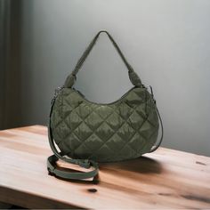 New Olivya Mini Hobo Nylon Crossbody Bag Green 12.25 "W X 7"H X 2"D Small Sized Bag Top Zip Closure Interior: 2 Interior Slip Pockets & 1 Zip Pocket Exterior:1 Back Slip Pocket Gun Metal Hardware 0.6 Lbs Body: Polyester Trim:Pu,Polyester Lining Spot Clean Imported On-the-go Nylon Hobo Shoulder Bag, Nylon Shoulder Hobo Bag For On-the-go, Green Nylon Shoulder Bag For On-the-go, Versatile Khaki Nylon Bag, Trendy Nylon Hobo Crossbody Bag, Nylon Crossbody Hobo Bag With Zipper Closure, Khaki Nylon Bag With Removable Pouch, Khaki Nylon Bags With Zipper Closure, Khaki Nylon Bag With Zipper Closure