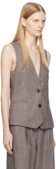 FSC®-certified wool-blend herringbone vest. · Plunging V-neck · Button closure · Welt pockets · Pin-buckle tab at back · Full satin lining Supplier color: Coffee bean Wool Vest With Button Closure For Workwear, Single-breasted V-neck Vest For Fall, Brown Wool Sweater Vest For Workwear, Herringbone Vest, Birger Christensen, Color Coffee, Coffee Bean, Welt Pockets, Welt Pocket