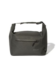 a gray bag sitting on top of a white surface