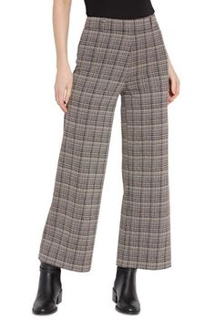 Ponte jacquard in polished plaid elevates these pull-on high-waist pants cut in a trendy wide-leg silhouette. 28" inseam; 11 1/4" leg opening; 12" front rise; 15 1/2" back rise Pull-on style Back patch pockets Extrawide, interior smoothing waistband 76% polyester, 19% viscose, 5% elastane Machine wash, line dry Imported Chic Plaid Straight Leg Pants, Casual Plaid Wide Leg Pants For Fall, Elegant Plaid Wide-leg Pants, Elegant High-waisted Plaid Pants, Chic Plaid Wide Leg Pants, Elegant Plaid Bottoms For Fall, Formal Wide Leg Pants For Fall, Plaid Wide Leg Bottoms For Fall, Plaid Wide-leg Pants For Fall