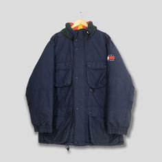 "Vintage Tommy Hilfiger Puffer Parka Jacket XLarge Tommy Hilfiger Sailing Gear Bomber Jacket Tommy Winter Wear Skiing Cold Weather Jacket XL Please contact me for any questions about this clothing before buying. Size on tag : Size XL Measurement : Armpit to armpit : 25\" inches Back collar to hem (total length) : 33\" inches Weight : 1.54 kg Condition : Good Condition. No holes and stains.  Delivery / Postage :- DHL EXPRESS / EXPEDITED = 3-5 business day. ** WE ARE USING DHL EXPRESS, IT TAKES 3- Winter Outerwear With Pockets For Outdoor Activities, Winter Outerwear With Pockets For Outdoor, Outdoor Winter Wear Hooded Jacket With Pockets, Sporty Puffer Jacket With Pockets For Hiking, Winter Sport Coat With Fleece Lining For Outdoor, Winter Outdoor Sport Coat With Fleece Lining, Hooded Jacket With Pockets For Winter Sports, Winter Parka For Outdoor With Long Sleeves, Winter Sports Outerwear With Pockets